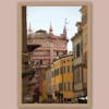 Wooden framed print of the pink marble Baptistery of Parma and the typical colorful houses of the city. Shot by Photographer Scott Allen Wilson