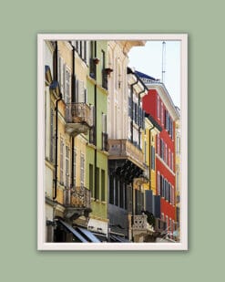 White framed print of colorful buildings in Parma. Created by Photographer Scott Allen Wilson