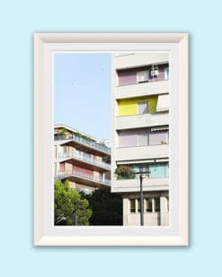 A white framed print of colorful buildings in Pescara, Italy. By Photographer Scott Allen Wilson.