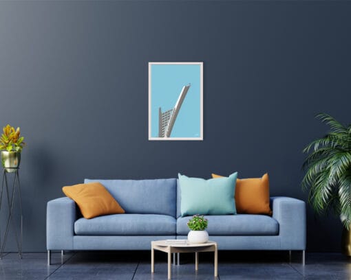 A print of a unique detail of the Ponte Ennio Flaiano, Italy, hanging in a dark colored living-room with a blue sofa and plants. By Photographer Scott Allen Wilson.