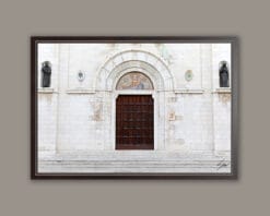 A brown framed print of the San Cetteo Cathedral in Pescara, Italy. Captured by Photographer Scott Allen Wilson.