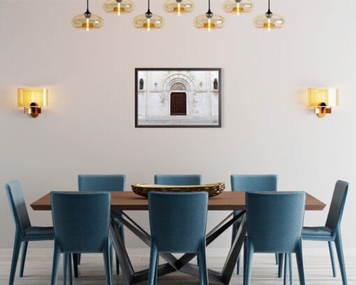 A brown framed print of the San Cetteo Cathedral in Pescara, Italy, hanging in a modern kitchen. Captured by Photographer Scott Allen Wilson.