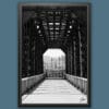 A black framed print of an iron bridge in Pescara, Italy. By Photographer Scott Allen Wilson.