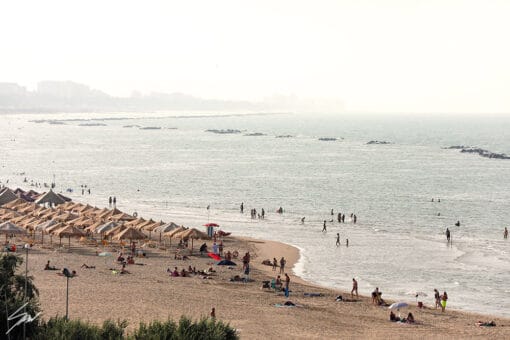 A crowded beach in Pescara, Italy. Shot by Photographer Scott Allen Wilson.