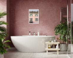 Print of Teatro Michetti in Pescara, Italy, hanging in a modern bathroom with a big bathtub and house plants. By Photographer Scott Allen Wilson.