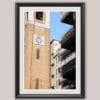 A black framed print of a clock tower in Pescara, Italy. By Photographer Scott Allen Wilson.