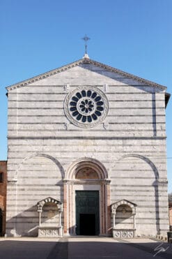 The façade of San Francesco Church in Lucca, Italy, with a rose window. By Photographer Scott Allen Wilson.
