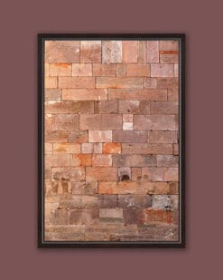 A dark brown framed print of a red brick wall in the city of Lucca, Italy. By Photographer Scott Allen Wilson.