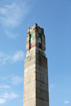 A monument in Lucca, Italy, displaying the colors of the Italian flag: green, white and red. By Photographer Scott Allen Wilson.