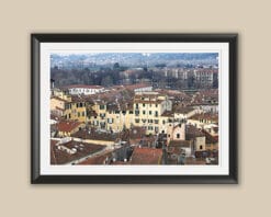 A black framed print of a view of the city of Lucca, Italy. By Photographer Scott Allen Wilson.