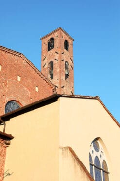 A red brick tower in Lucca, Italy. By Photographer Scott Allen Wilson.