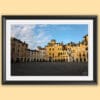 A black framed print of piazza dell’anfiteatro in the city of Lucca, Italy. By Photographer Scott Allen Wilson.