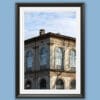 A black framed print of shadows playing on a building in the city of Lucca, Italy. By Photographer Scott Allen Wilson.