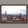 A dark brown framed print of the city of Lucca, Italy. By Photographer Scott Allen Wilson.
