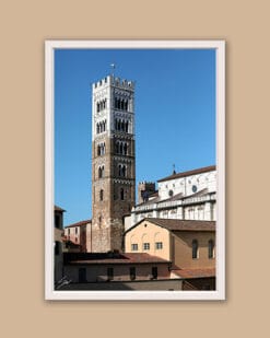 A white framed print of the San Martino Cathedral tower in the city of Lucca, Italy. By Photographer Scott Allen Wilson.