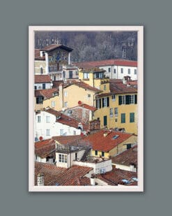 A white framed print of a view of the city of Lucca, Italy. By Photographer Scott Allen Wilson.