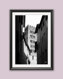 A black framed b&w print of Torre San Frediano in Lucca, Italy. By Photographer Scott Allen Wilson.