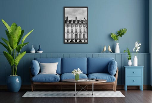 A b&w framed print of an elegant building in Torino, Italy, hanging in a modern living room. By Photographer Scott Allen Wilson.