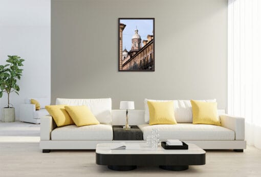 An ebony framed print of architecture in Torino, Italy, hanging in a modern living room. By Photographer Scott Allen Wilson.