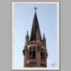 A white framed print of a pointy tower in Torino, Italy. By Photographer Scott Allen Wilson.