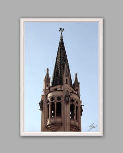 A white framed print of a pointy tower in Torino, Italy. By Photographer Scott Allen Wilson.