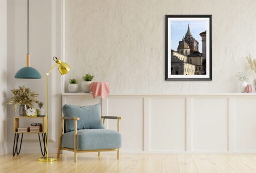 A black framed print of the Holy Shroud Chapel in Torino, Italy, hanging in a classic living room. By Photographer Scott Allen Wilson.