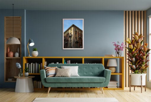 A white framed print of noble palace in Torino, Italy, hanging in a modern living room. By Photographer Scott Allen Wilson.