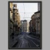 A black framed print of the tram railway system in Torino, Italy. By Photographer Scott Allen Wilson.