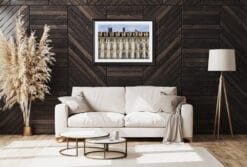 A black framed print of the Royal Palace of Torino, Italy, hanging in a modern living room. By Photographer Scott Allen Wilson.