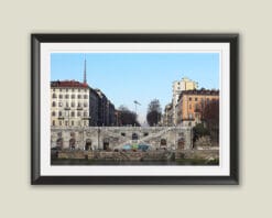 A black framed print of the banks of the river Po in Torino, Italy. By Photographer Scott Allen Wilson.