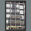 A black framed print of the Mole Antonelliana reflected in the glass façade of a modern building in Torino, Italy. By Photographer Scott Allen Wilson.