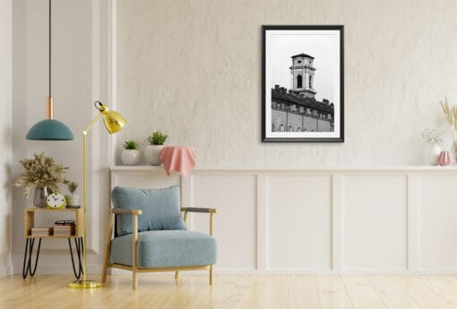 A B&W framed print of architecture in Torino, Italy, hanging in a minimal living room. By Photographer Scott Allen Wilson.