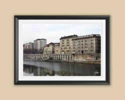 A black framed print of the banks of the river Po in Torino, Italy. By Photographer Scott Allen Wilson.