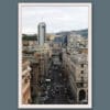 White framed artistic print of a busy road in Genova crowded with vehicles and surrounded by urban structures. Photo captured by Travel Photographer Scott Allen Wilson.