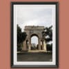 Wooden framed artwork by Travel Photographer Scott Allen Wilson, featuring the grand Arco di Trionfo of genova, rising tall against the sky.