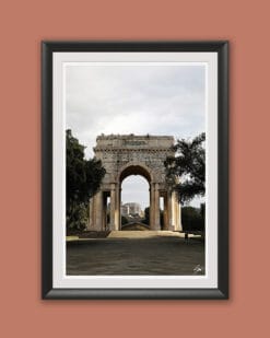 Wooden framed artwork by Travel Photographer Scott Allen Wilson, featuring the grand Arco di Trionfo of genova, rising tall against the sky.