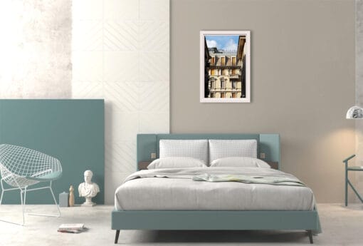 Hanging on the wall of a cool toned, modernistic bedroom is the gorgeous image of this Genovese historical house, producing an exquisite contrast between the classical details of the facade and the futuristic-looking ambience.