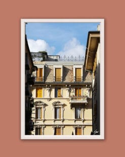 Wooden framed artistic print of a charming facade in the city of Genova, Italy, shining in earthy colors under the bright sun of noon.