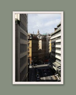 White framed artistic print of a gorgeous landscape showcasing the shadows cast on the charming buildings of Genova, Italy. Photo captured by Travel Photographer Scott Allen Wilson.