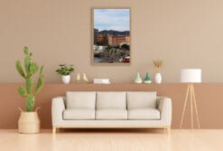 The warm tones of the blocks and rocks, hit by golden sun beams in this radiant photograph, tastefully match the peachy painted decors of this living room.