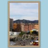 Wooden framed artistic print of a lovely scenery in Genova, Italy, showcasing a rocky beach under colorful houses. Photo captured by Travel Photographer Scott Allen Wilson.