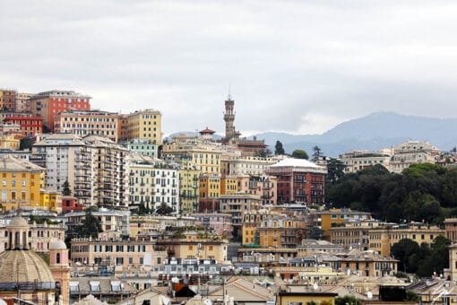 Assortment of colorful blocks rising on the side of a hill in Genova, Italy. Photo captured by Travel Photographer Scott Allen Wilson.