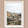 Wooden framed artistic print of a colorful hillside of stacked buildings. Photo captured in Genova, Italy, by Travel Photographer Scott Allen Wilson.