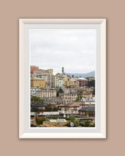 Wooden framed artistic print of a colorful hillside of stacked buildings. Photo captured in Genova, Italy, by Travel Photographer Scott Allen Wilson.