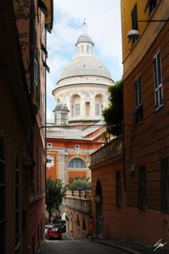 A grand dome towers over the bright orange facades. Photo captured by Travel Photographer Scott Allen Wilson.