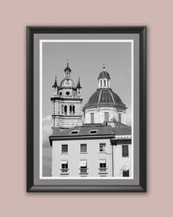 Gorgeous piece of art framed by a grey passe-partout, showcasing an imposing tower and its dome create a visual illusion that gives this artistic work a magnetic charm.