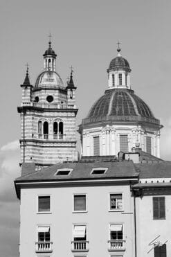 In this beautiful shot Travel Photographer Scott Allen Wilson shows the highest points of the Cattedrale di San Lorenzo, rising above the facade of a house in the heart of the city of Genova.