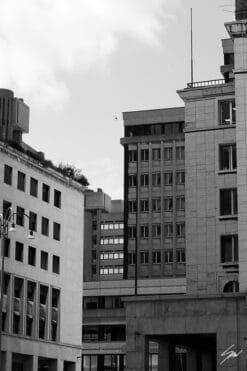 Minimalist residential blocks rise tall amidst the streets of the city of Genova, where every sound seems to have stopped and silence reigns supreme.